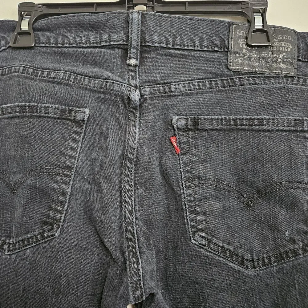 Levi's Men's Regular Fit Jean, 33Wx32L measures 31.5 Black VGUC